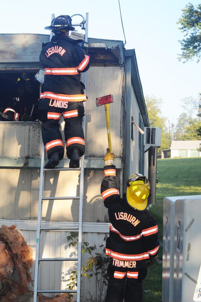 Mobile Home Filled with smoke on Friday morning, September 20.  Photo by Curt Werner