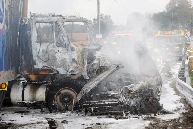 Fire crash between passenger car and tractor trailer on 10/15/12.  photo by Curt Werner.