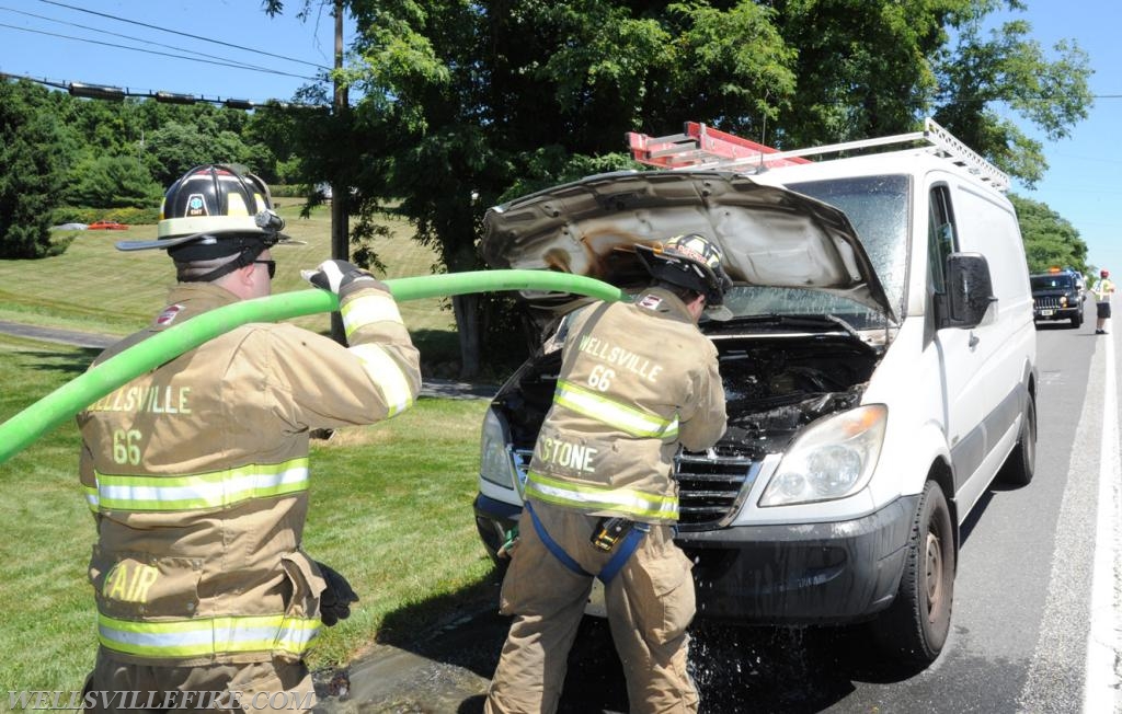 Van fire on Old York Road, Monday, July 9.  Photo by curt werner  In photo Chris Stone and Nyck Fair.