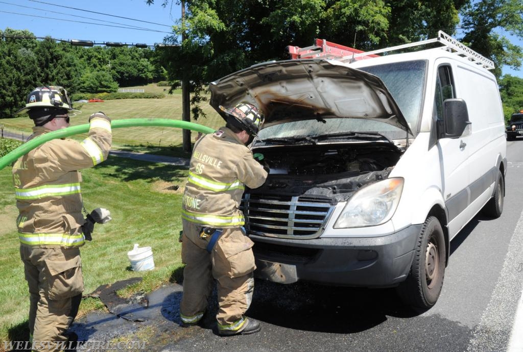 Van fire on Old York Road, Monday, July 9.  Photo by curt werner  In photo Chris Stone and Nyck Fair.