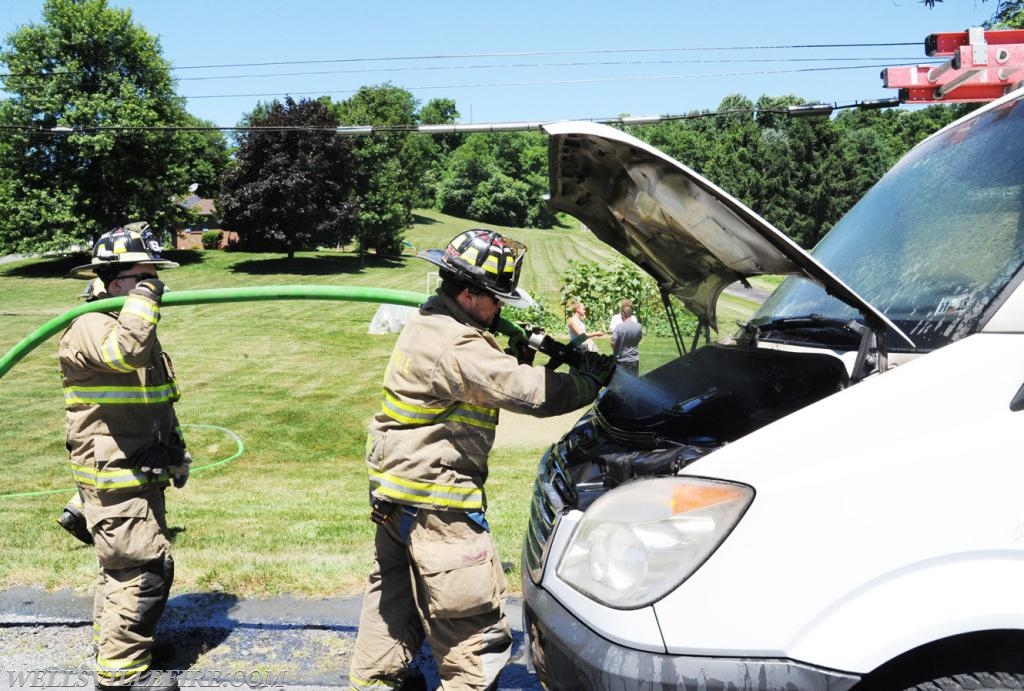 Van fire on Old York Road, Monday, July 9.  Photo by curt werner  In photo Chris Stone and Nyck Fair.