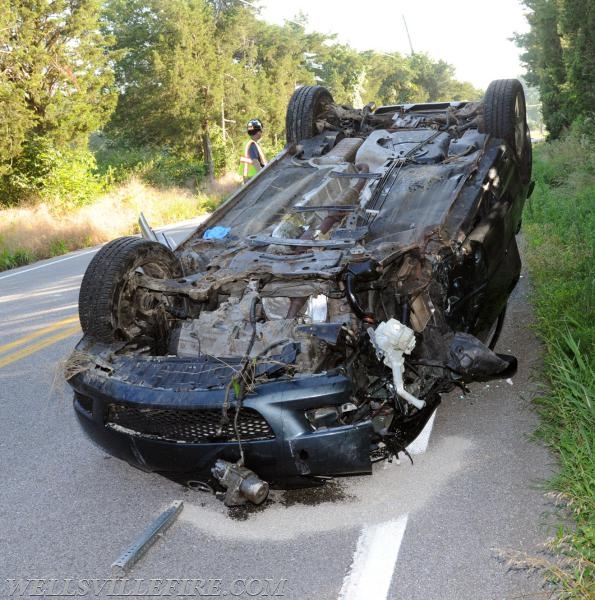 Friday, July 21, roll over on Wellsville Road.  photos by curt werner