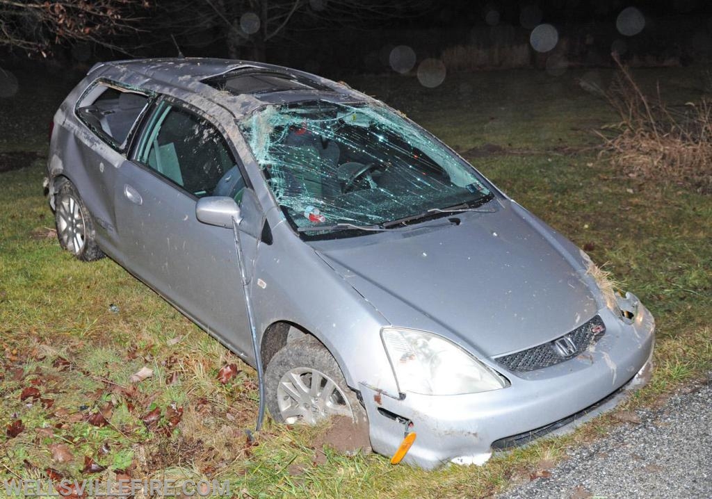 
Late Monday afternoon, December 30, a vehicle rolled over in the three hundred block of Wellsville Road, Warrington Township.  Wellsville Fire Company, fire police and Pa. State Police were on the scene. phot


