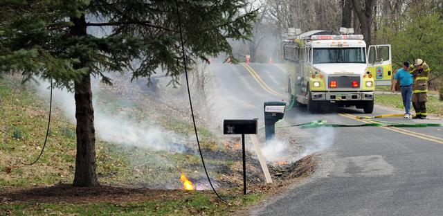 On Monday, April 14, a tree fell on wires, falling across Stone Jug Road catching brush on fire.