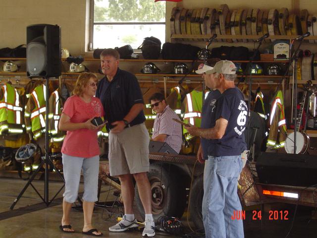 Craig Harlacker, Andy Slothower, and Dean Trump presenting Shirley Harbold with a plaque for 40 years of service at Annual Appreciation Picnic-Photo by Stacy Shank