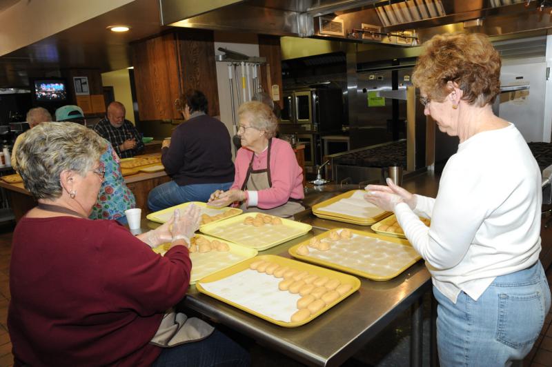 Volunteers making Easter Eggs on Monday, February 29, 2016.  photos by Curt Werner