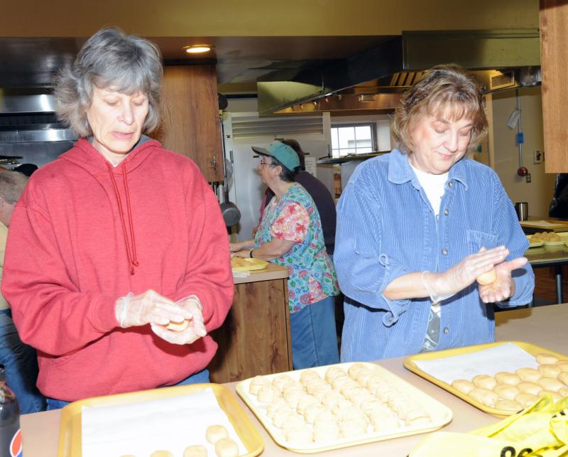 Volunteers making Easter Eggs on Monday, February 29, 2016.  photos by Curt Werner