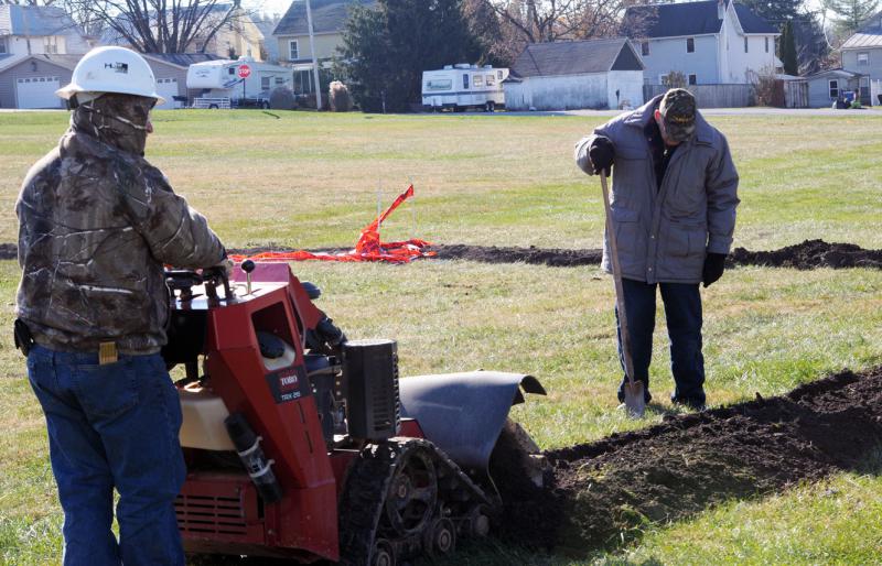 On Friday, November 21,  Adams Electric and volunteers put up telephone poles and under ground wiring for the new lightning.