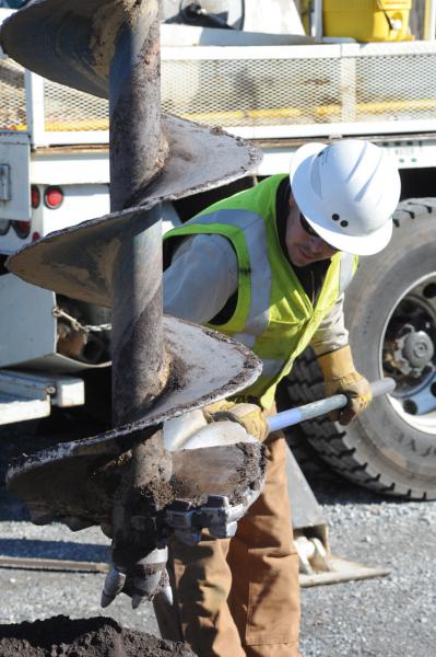 On Friday, November 21,  Adams Electric and volunteers put up telephone poles and under ground wiring for the new lightning.